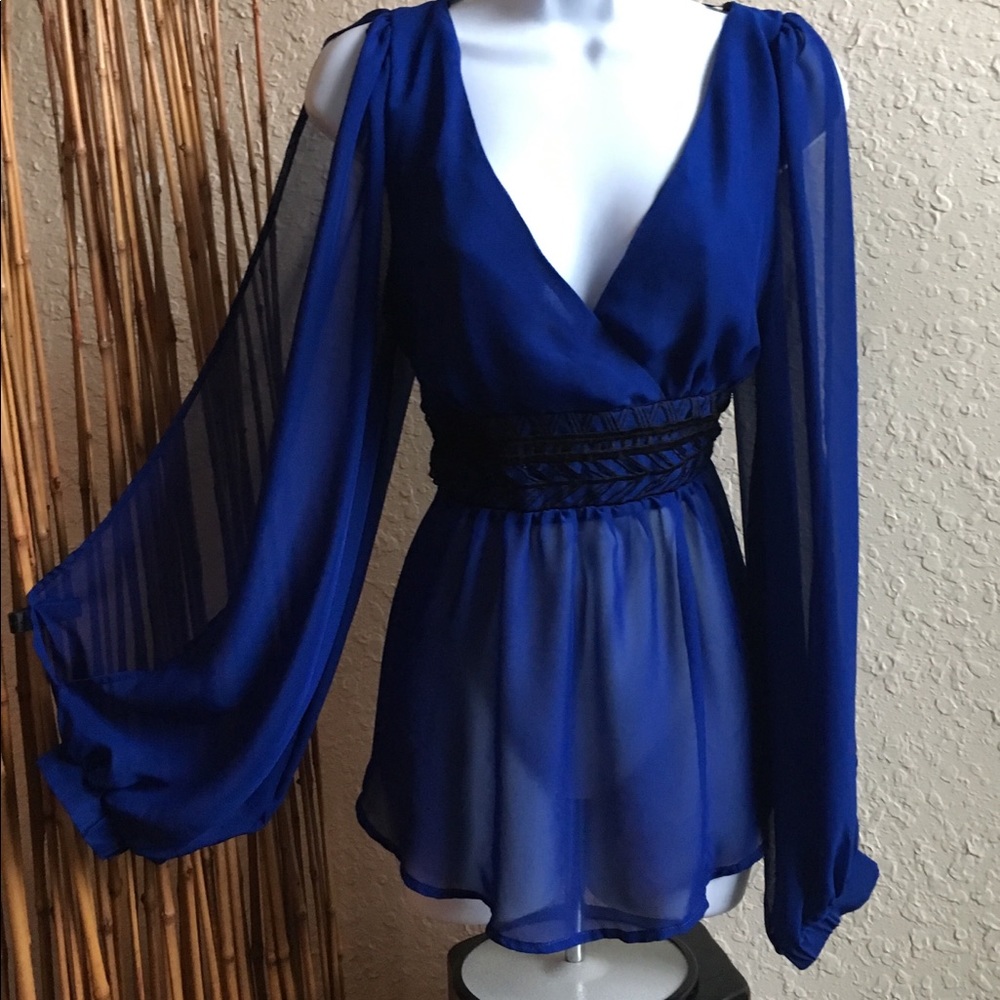 XOXO Size L.  Beautiful sheer blue/black detail.